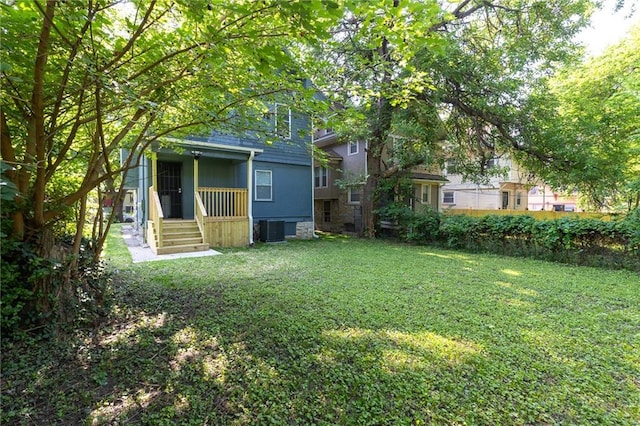 3428 College Ave, Kansas City, MO 64128 - view of grassy yard featuring a porch