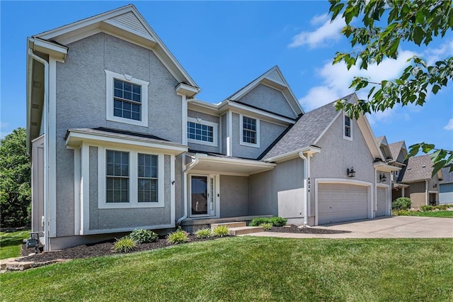 4824 W 162nd St, Overland Park, KS 66085 - traditional home featuring stucco siding, a front lawn, concrete driveway, and a garage