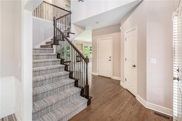 4824 W 162nd St, Overland Park, KS 66085 - stairway featuring wood finished floors and baseboards