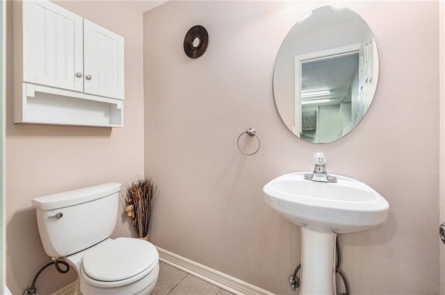 4824 W 162nd St, Overland Park, KS 66085 - half bathroom with toilet and tile patterned flooring