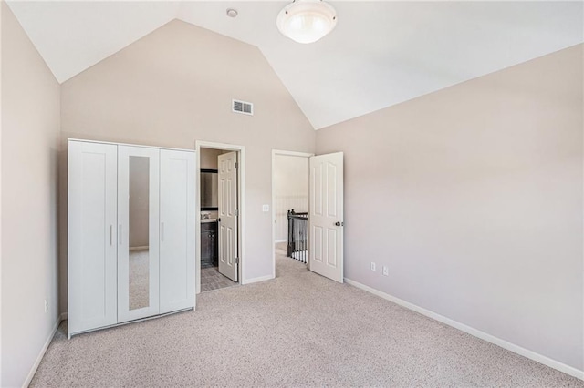 4824 W 162nd St, Overland Park, KS 66085 - unfurnished bedroom featuring high vaulted ceiling, carpet floors, and connected bathroom