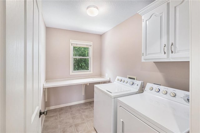 4824 W 162nd St, Overland Park, KS 66085 - laundry room featuring cabinet space, washing machine and clothes dryer, and a textured ceiling