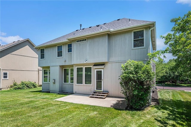 4824 W 162nd St, Overland Park, KS 66085 - back of house featuring entry steps, a yard, a patio, and roof with shingles