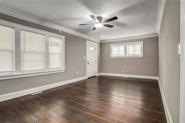 4600 Chestnut Ave, Kansas City, MO 64130 - spare room with crown molding, a ceiling fan, dark wood-style floors, and a textured ceiling