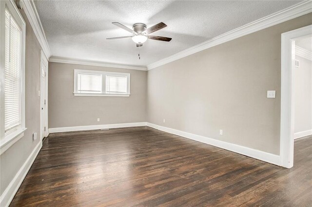 4600 Chestnut Ave, Kansas City, MO 64130 - empty room featuring ceiling fan, crown molding, dark wood-type flooring, and a textured ceiling