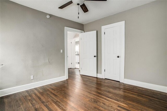 4600 Chestnut Ave, Kansas City, MO 64130 - unfurnished bedroom featuring wood finished floors and ceiling fan