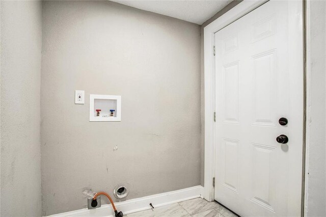 4600 Chestnut Ave, Kansas City, MO 64130 - washroom featuring hookup for a gas dryer, hookup for a washing machine, and hookup for an electric dryer