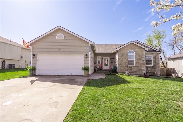 2180 Rock Creek Dr, Tonganoxie, KS 66086 - ranch-style home with an attached garage, driveway, a front yard, and stone siding