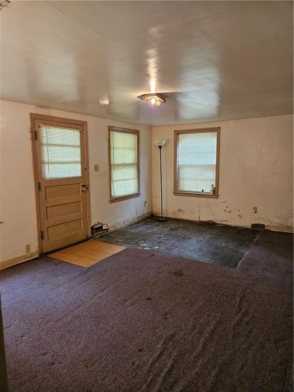 1419 W College Ter, Independence, MO 64050 - foyer entrance with dark carpet
