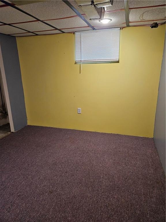 1419 W College Ter, Independence, MO 64050 - below grade area featuring carpet floors