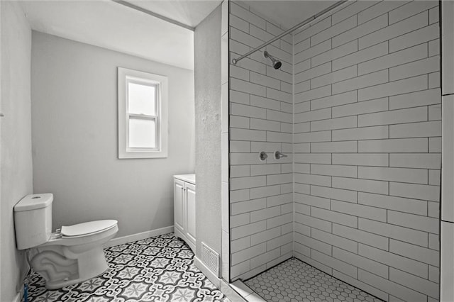 520 Sandusky Ave, Kansas City, KS 66101 - bathroom with a stall shower, vanity, and tile patterned flooring