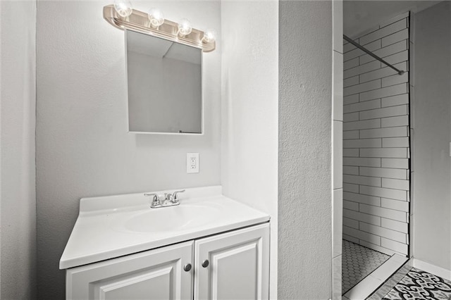 520 Sandusky Ave, Kansas City, KS 66101 - bathroom featuring tiled shower and vanity