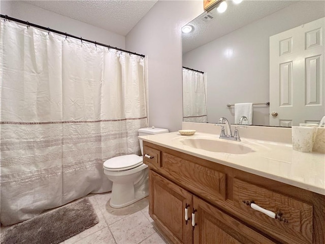 4117 NE Edgewater Ct, Lees Summit, MO 64064 - bathroom with a textured ceiling, vanity, and tile patterned flooring