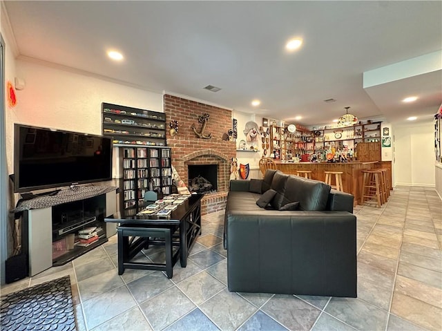 4117 NE Edgewater Ct, Lees Summit, MO 64064 - living room with a bar, a fireplace, and recessed lighting