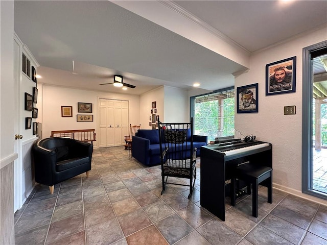 4117 NE Edgewater Ct, Lees Summit, MO 64064 - living area featuring healthy amount of natural light, ceiling fan, dark stone finish floors, and ornamental molding