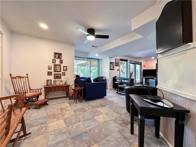 4117 NE Edgewater Ct, Lees Summit, MO 64064 - living area with a ceiling fan, recessed lighting, and light stone finish floors