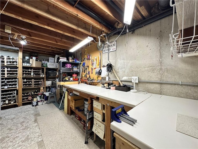 4117 NE Edgewater Ct, Lees Summit, MO 64064 - unfinished below grade area with a workshop area