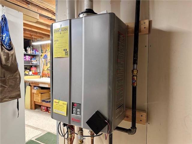 4117 NE Edgewater Ct, Lees Summit, MO 64064 - utility room featuring tankless water heater