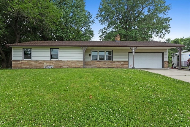 1219 W 35th St, Independence, MO 64055 - ranch-style house with an attached garage, a chimney, a front lawn, driveway, and stone siding