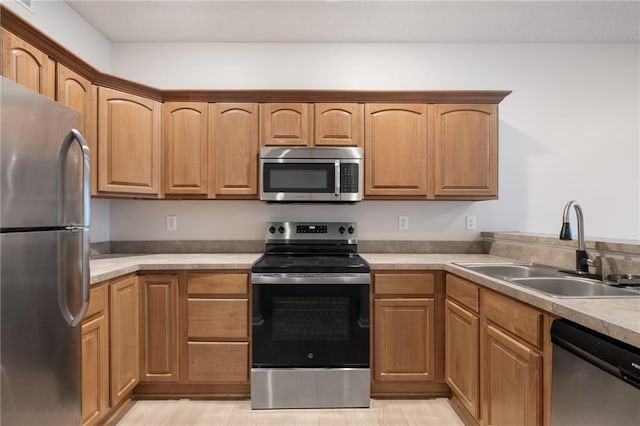461 S Woodson Ln, Gardner, KS 66030 - kitchen with stainless steel appliances and light countertops