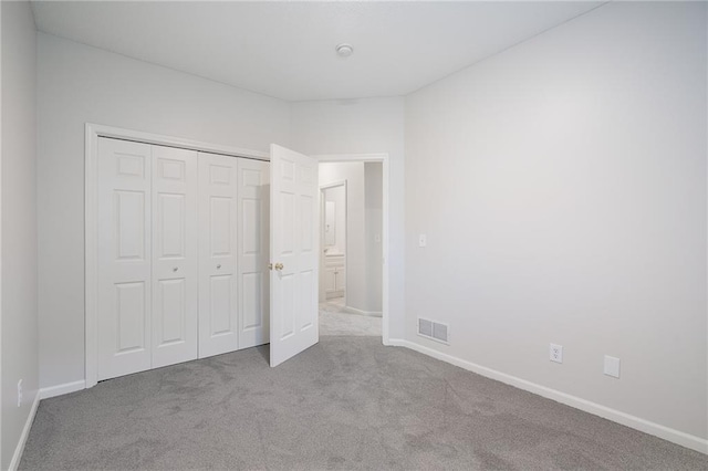 461 S Woodson Ln, Gardner, KS 66030 - unfurnished bedroom with carpet floors and a closet