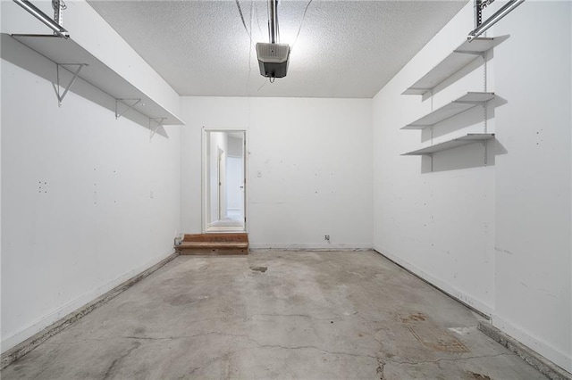 461 S Woodson Ln, Gardner, KS 66030 - garage with a garage door opener and baseboards
