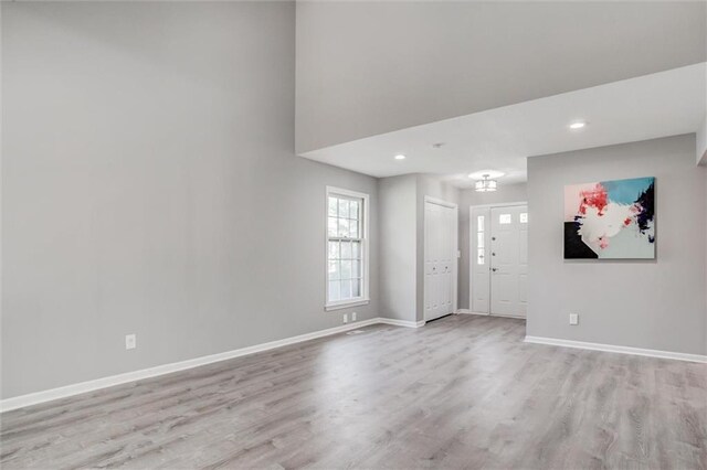 12321 W 105th Ter, Overland Park, KS 66215 - foyer with light wood finished floors and recessed lighting