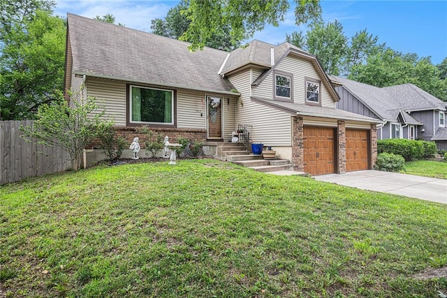 1422 S Kiowa Dr, Olathe, KS 66062 - view of front of home with concrete driveway and a shingled roof