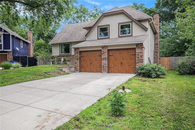 1422 S Kiowa Dr, Olathe, KS 66062 - view of front facade with driveway, a chimney, an attached garage, and a shingled roof