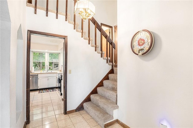 1422 S Kiowa Dr, Olathe, KS 66062 - stairs with a chandelier and tile patterned flooring