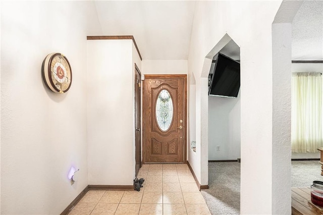 1422 S Kiowa Dr, Olathe, KS 66062 - entryway with light tile patterned flooring and vaulted ceiling