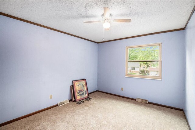 1422 S Kiowa Dr, Olathe, KS 66062 - carpeted spare room featuring crown molding, ceiling fan, and a textured ceiling