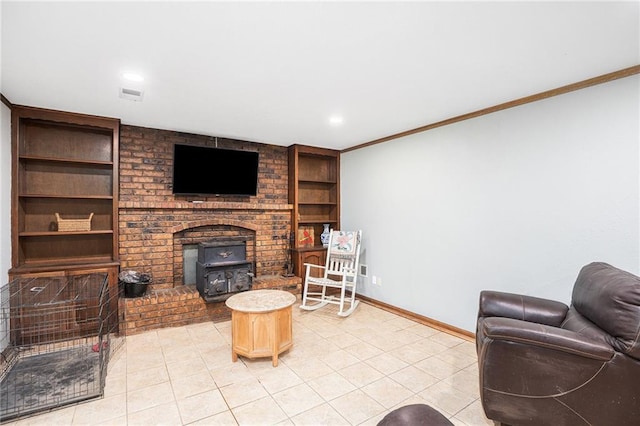 1422 S Kiowa Dr, Olathe, KS 66062 - living room with a wood stove, light tile patterned flooring, built in shelves, ornamental molding, and recessed lighting