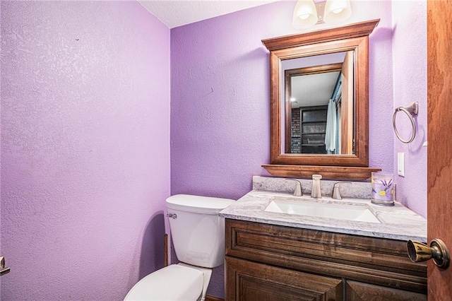 1422 S Kiowa Dr, Olathe, KS 66062 - half bath with a textured wall and vanity