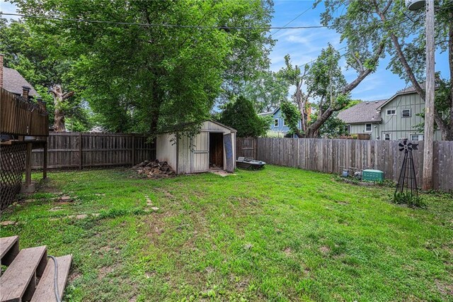 1422 S Kiowa Dr, Olathe, KS 66062 - fenced backyard featuring a storage shed