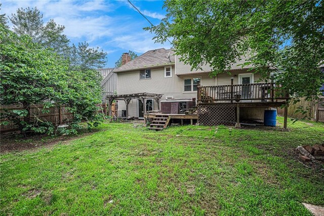 1422 S Kiowa Dr, Olathe, KS 66062 - rear view of house with a deck, a pergola, and a chimney