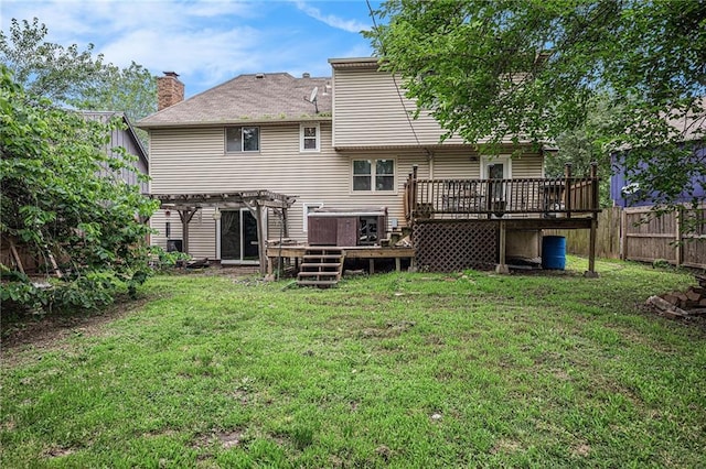 1422 S Kiowa Dr, Olathe, KS 66062 - rear view of house with a wooden deck, a pergola, and a chimney