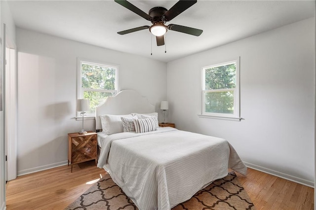 811 NW Maynard St, Blue Springs, MO 64015 - bedroom featuring light wood-style flooring and a ceiling fan