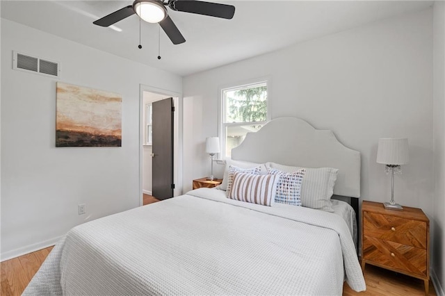 811 NW Maynard St, Blue Springs, MO 64015 - bedroom featuring wood finished floors and a ceiling fan