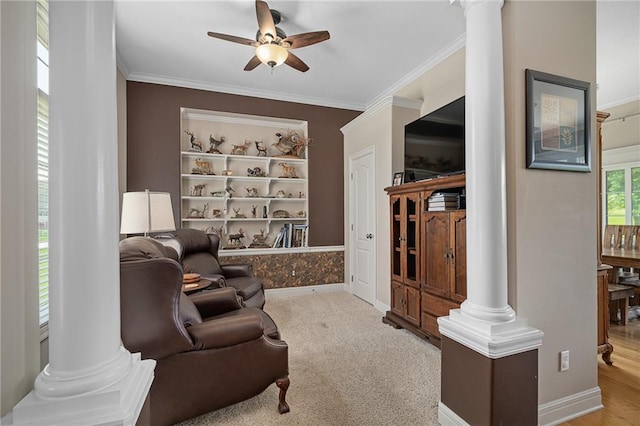 4148 SE Paddock Dr, Lees Summit, MO 64082 - living area featuring decorative columns, ornamental molding, and ceiling fan