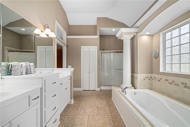 4148 SE Paddock Dr, Lees Summit, MO 64082 - bathroom with decorative columns, vanity, a garden tub, a shower stall, and lofted ceiling