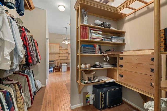 4148 SE Paddock Dr, Lees Summit, MO 64082 - spacious closet with light wood-style flooring