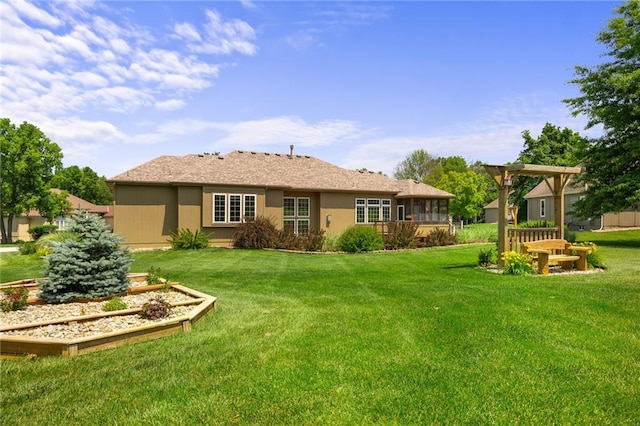 4148 SE Paddock Dr, Lees Summit, MO 64082 - back of house featuring a yard and a vegetable garden