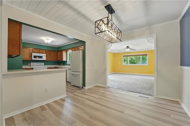 304 SE Moore St, Blue Springs, MO 64014 - kitchen featuring white appliances, light wood finished floors, open floor plan, ceiling fan, and light countertops