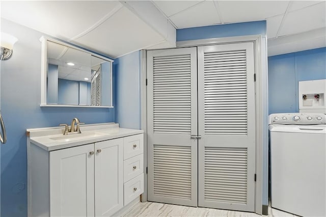 304 SE Moore St, Blue Springs, MO 64014 - bathroom with washer / clothes dryer and vanity