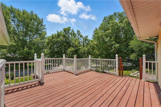 304 SE Moore St, Blue Springs, MO 64014 - deck featuring view of scattered trees