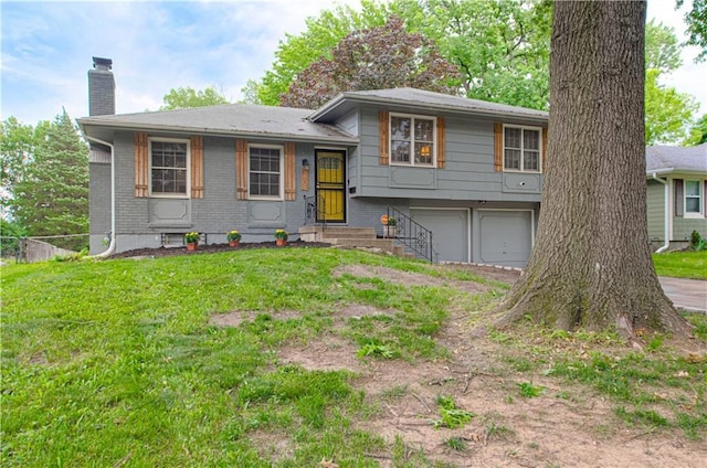 11709 Fuller Ave, Kansas City, MO 64134 - split level home featuring a chimney, brick siding, and a garage