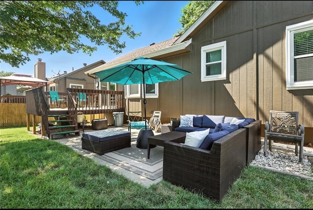 2541 NE Dale Hunter Ln, Lees Summit, MO 64086 - view of patio / terrace with an outdoor living space and a wooden deck