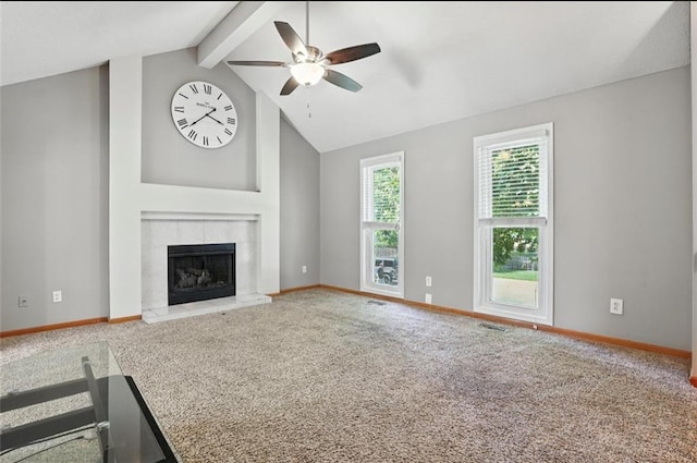2541 NE Dale Hunter Ln, Lees Summit, MO 64086 - unfurnished living room with a ceiling fan, carpet flooring, and a tile fireplace