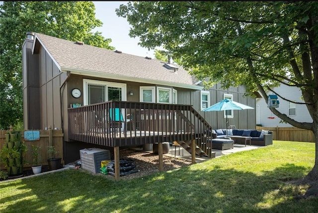 2541 NE Dale Hunter Ln, Lees Summit, MO 64086 - rear view of house featuring an outdoor living space, a deck, roof with shingles, and a patio